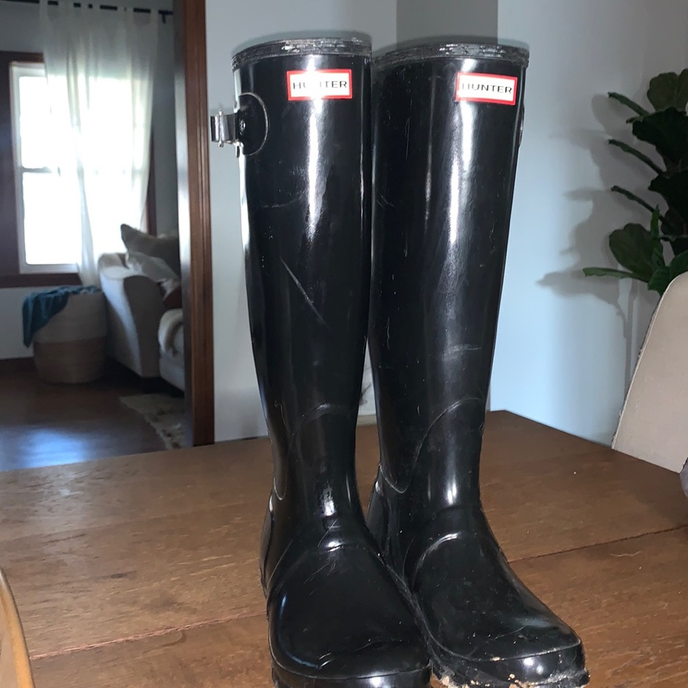 Black shiny hunter boots